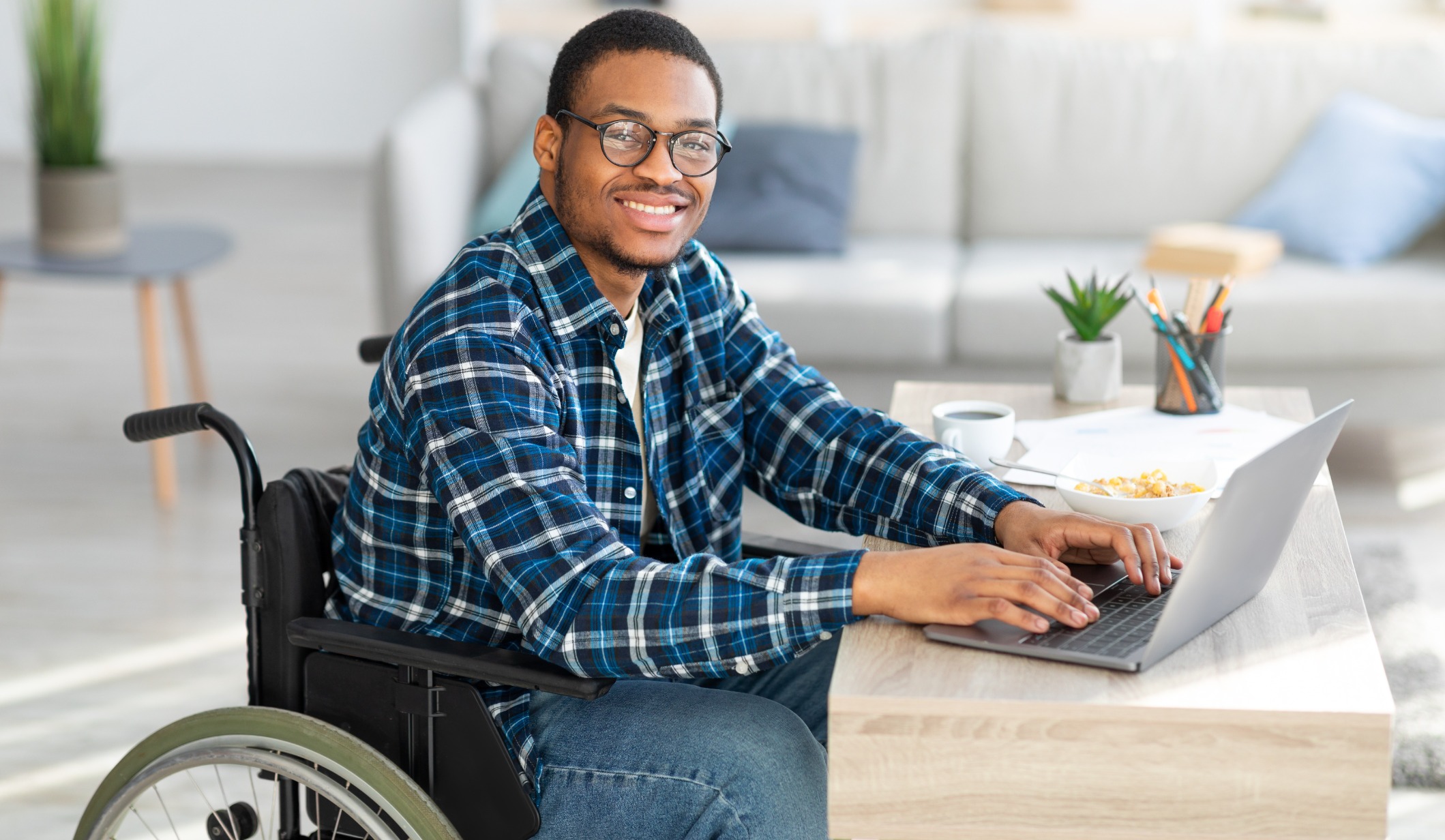 Man on the computer smiling 